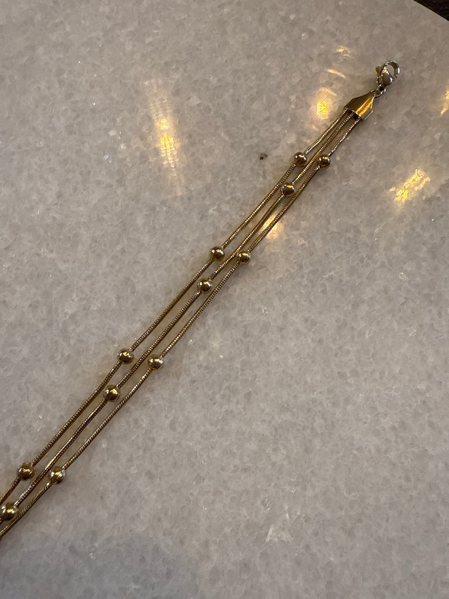 Armband trippel dot goud