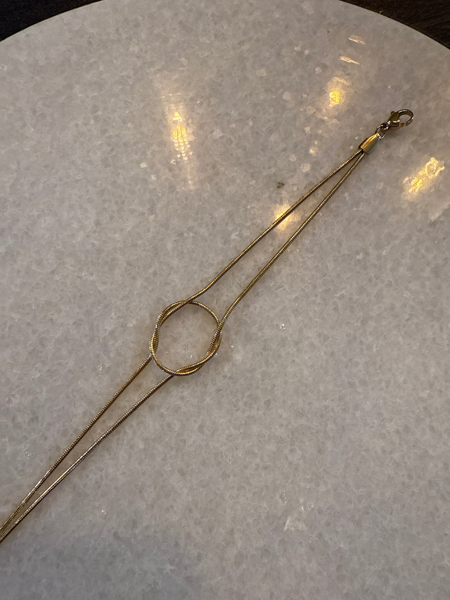 Armband double knot goud